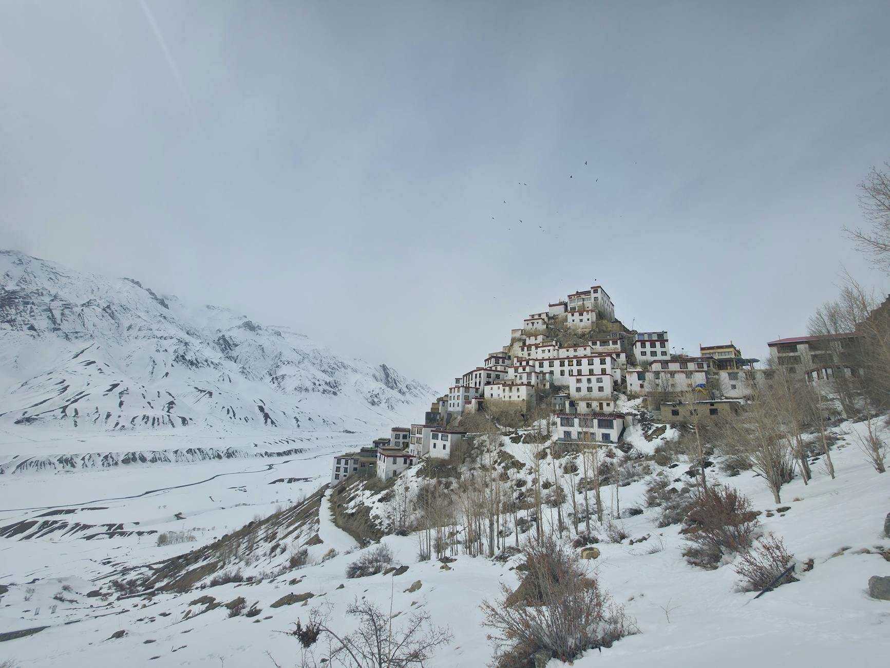 Spiti Valley winter travel guide — frozen river monastery snow landscape Himachal Pradesh by Shivi Goyal spiritedblogger